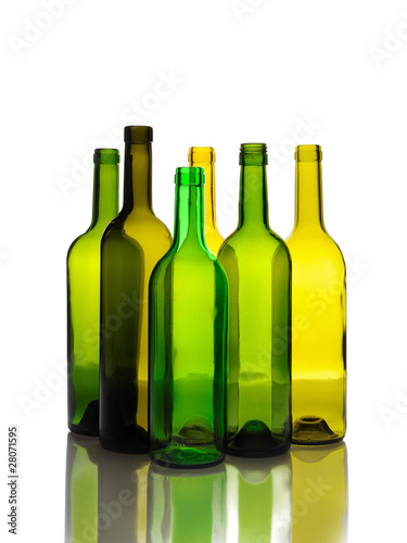 Photo: Many empty green wine bottles isolated on white background Many empty green wine bottles isolated on white background