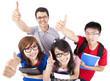 Happy young people showing thumbs up Happy young people showing thumbs up