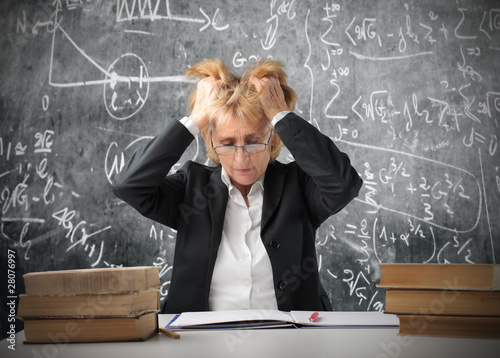 Photo: Correcting tests Correcting tests