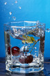 cherry splashed into water