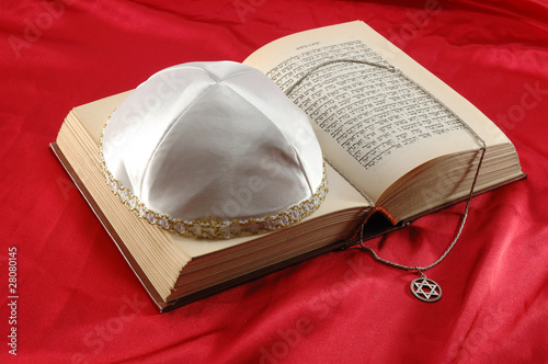 Photo: Jewish holiday still life with torah,david star and kippah Jewish holiday still life with torah,david star and kippah