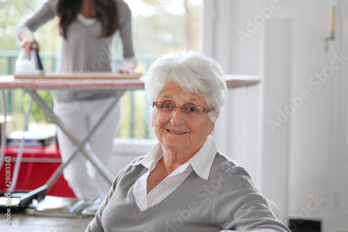 Photo: Closeup of elderly woman with home help Closeup of elderly woman with home help
