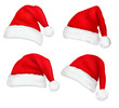 Four red Santa hats. Vector.