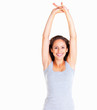 Happy woman stretching out her arms and midsection