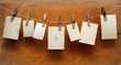 vintage photographs hang on the clothespin isolated on Wood wall vintage photographs hang on the clothespin isolated on Wood wall