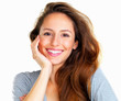 Joyful woman resting face on hand