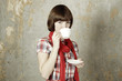 Young girl drinking coffee