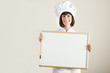 Photo: Chef Holding Blackboard Chef Holding Blackboard