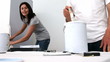 Cheerful couple renovating their bedroom in white