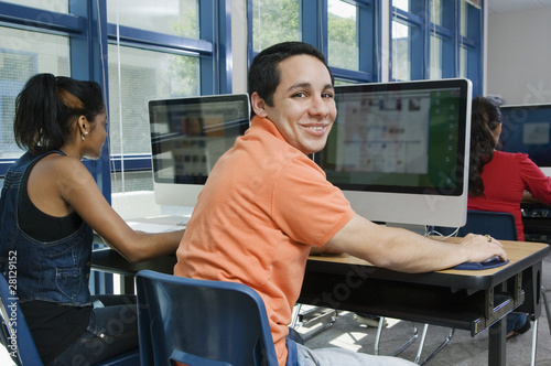 Photo: High School Students Using Flat Screen Monitors High School Students Using Flat Screen Monitors