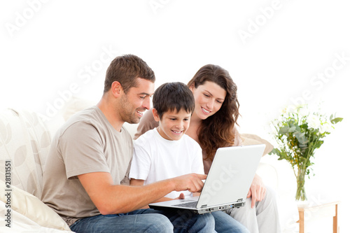 Photo: Handsome man showing something on the laptop screen Handsome man showing something on the laptop screen