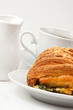 Breakfast: coffee and bun with cheese and spinach