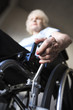 Woman operating wheelchair