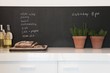 Chalkboard with kitchen herbs