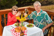 Couple Toasting the Viewer