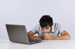 Young working with his laptop