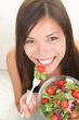 Woman eating healthy salad
