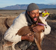 Man playing with dog Man playing with dog