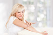 Beauty woman using moisturising cream Beauty woman using moisturising cream