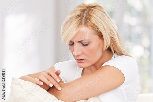 Photo: Beauty woman worrying about her skin Beauty woman worrying about her skin