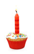 Cupcake with candle isolated on white background Cupcake with candle isolated on white background