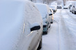 Close up of cars in snow during winter Close up of cars in snow during winter