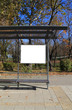 Black banner on a bus shelter.