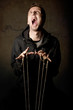 Man playing with strings Man playing with strings