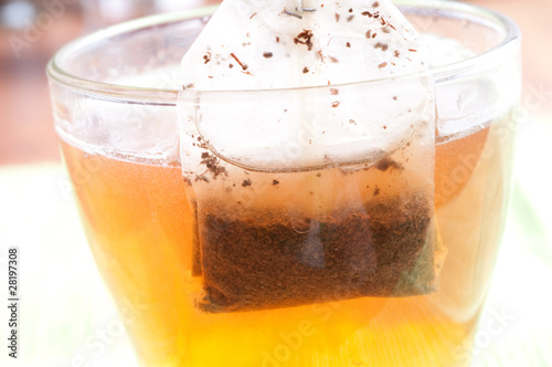 Photo: Teabag in the cup with hot water Teabag in the cup with hot water