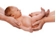 5 days old baby in parents hands