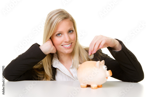 Photo: geld ins sparschwein werfen geld ins sparschwein werfen
