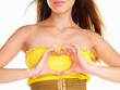 Woman making a heart sign