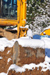 Excavator in snow
