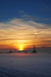 landscape at sunset with fog and snow