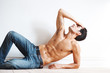 Photo: Relaxed young male fashion model posing Relaxed young male fashion model posing