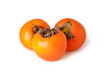 fresh persimmon fruits on a white background