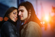 Happy couple in love in city at sunset Happy couple in love in city at sunset