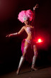 cabaret dancer over dark background