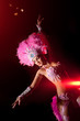 cabaret dancer over dark background