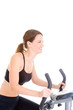 Smiling Caucasian Woman Riding Exercise Bike White Background