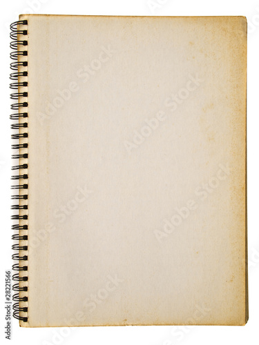 Photo: Yellowed spiral notebook isolated on white background Yellowed spiral notebook isolated on white background