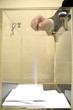 ballot box and hand putting a blank ballot inside