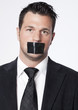 silence d'homme salarié baillonné