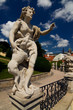 White statues of woman and animal