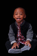 boy poses with big smile