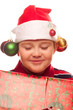 Christmas boy with a present making a wish