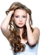 Beautiful teen girl with  long curly hairs