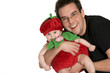 Father Holding Baby Wearing Halloween Costume Father Holding Baby Wearing Halloween Costume