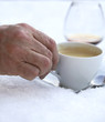 Drinking coffee with brandy in the snow