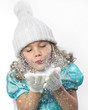 girl blowing snow